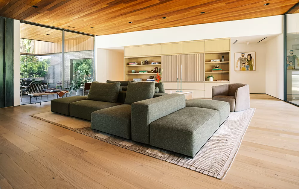 Poliform Westide modular sofa and Santa Monica swivel chair